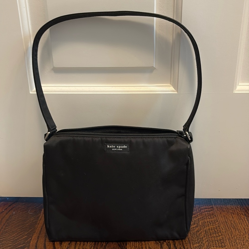 Vintage Kate Spade. Black satin shoulder bag with zip closure.
